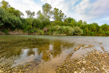 Black river at sunset, Romania, Europe