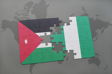 puzzle with the national flag of jordan and nigeria on a world map background.