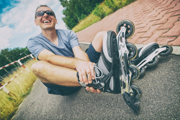 Injured skater with painful leg © Monika Wisniewska
