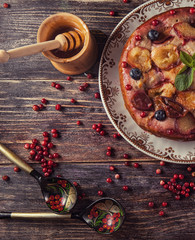 Berry cake with nuts on the table