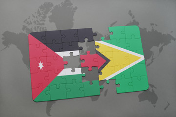 puzzle with the national flag of jordan and guyana on a world map background.