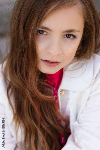 Portrait Of Beautiful Girl With Dark Hair And Brown Eyes