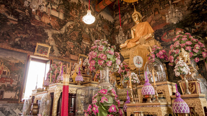 Buddha gold statue and thai art architecture in Wat Arun buddhist temple( Publice temple) In Bangkok ,Thailand.