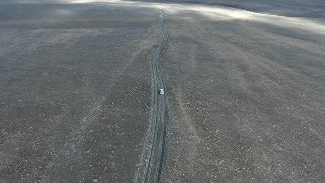 Driving through the barren highlands in Sprengisandur, Iceland.