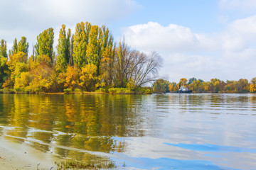 Scenic river landscape in autumn day