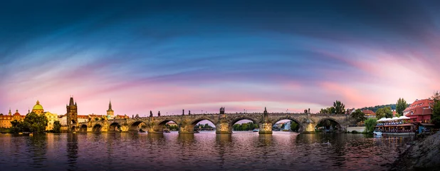 Fotobehang Panorama van Praag bij zonsondergang © Jakub Škyta