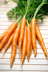 Fresh carrots on the gray backgrounds.