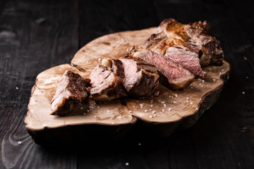 Sliced medium rare grilled Black Angus Steak Ribeye