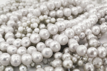 Pearl necklace. Shiny jewelry background 