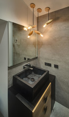 Modern bathroom with glowing lamps