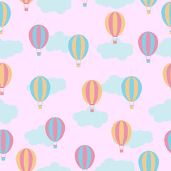 Seamless background with cute colorful hot air balloons on pink background suitable for children wallpaper, scrap paper, and postcard