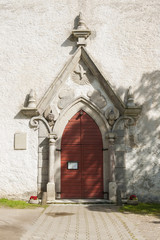 Fototapeta na wymiar Portal of the medieval Lutheran church in Keila, Estonia