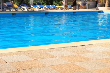 Edge of outdoor swimming pool for background