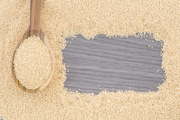 Healthy amaranth seeds in wooden spoon.