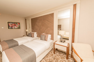 Modern hotel room with big bed
