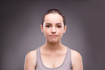 Portrait of young woman in sports concept