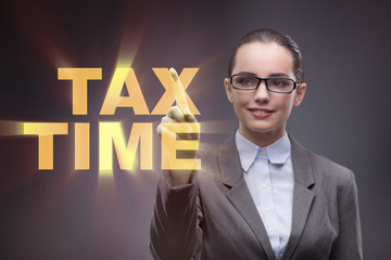Businesswoman in business tax concept