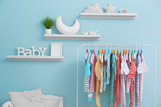 Shelves With Hanger In Modern Baby Room