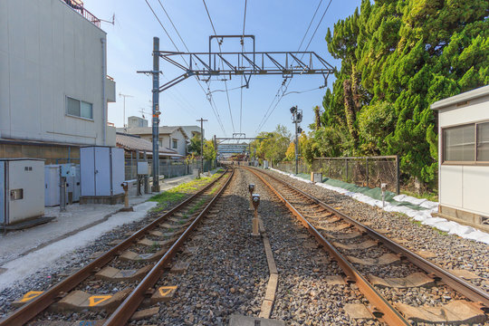 KYOTO, JAPAN -APRIL 15, 2015: Local railroad and Railroad crossing in Kyoto, Japan.