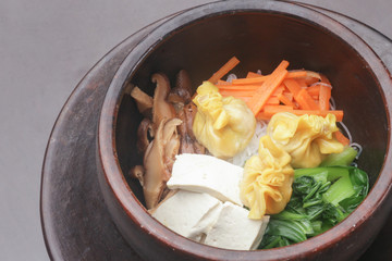 Top view of rice glass noodles with vegetable and dumplings
