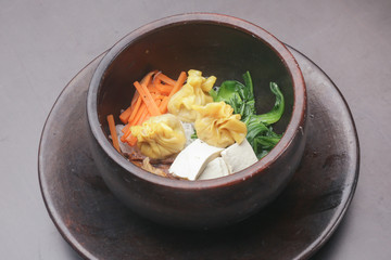 Top view of rice glass noodles with vegetable and dumplings
