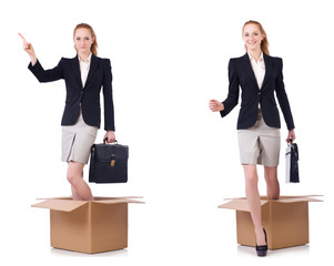 Businesswoman with boxes isolated on white