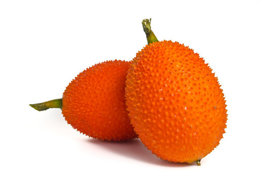 Gac fruit, typical of orange-colored plant foods in Asia isolate