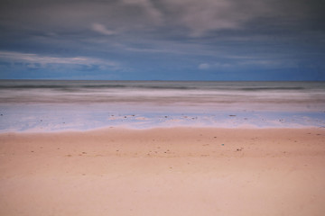 Early morning view of the beach at Polzeath Vintage Retro Filter