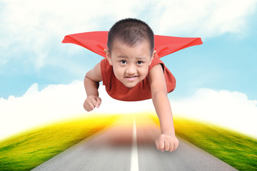 superhero boy child flying