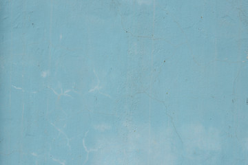 Wall fragment with scratches and cracks