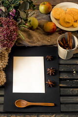 cozy still life of food with a black sheet  paper