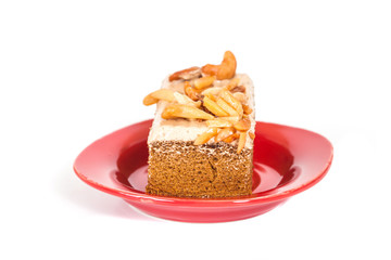 Coffee cake with cashew nut on white background