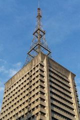 Fototapeta na wymiar Old building with communication tower