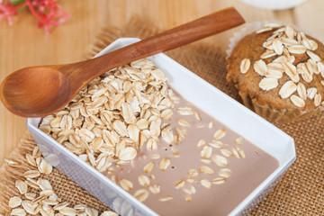 oat flakes mix with chocolate milk in blow