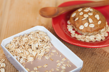 oat flakes mix with chocolate milk in blow
