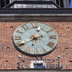 Clock on Hall Tower on Main Market Square , Krakow, Poland
