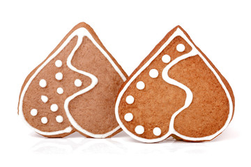 two cookies in the shape of  heart on  white background 