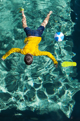 body of a boy in the pool, 
large fatal accident