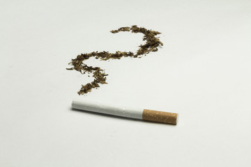 Cigarette with smoke / splash made out of tobacco. Creative, original, unusual. Isolated on white, lots of blank space for your text.