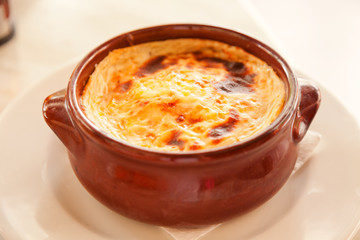 Greek style moussaka servered in a crock