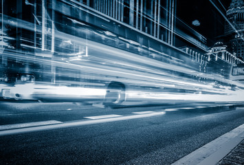 Fototapeta premium blurred traffic light trails on road at night in China.