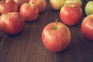 Apples on wooden rustic background
