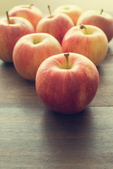 Apples on wooden rustic background