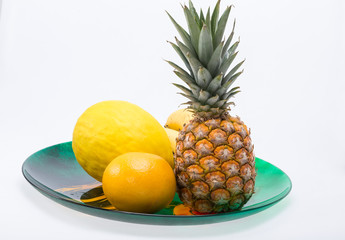 Assortment of fresh exotic fruits isolated on white