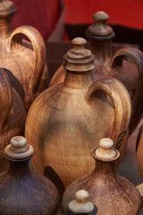 Fototapeta na wymiar Ceramic bottle. Image focus on the bottle in the center