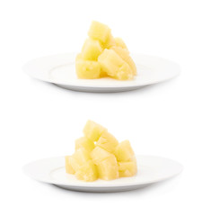 Pile of canned pineapple over isolated white background