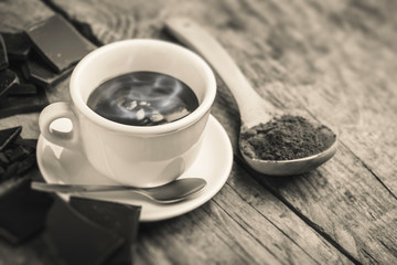 hot chocolate cup - black and white photo - tilt shift selective focus effect
