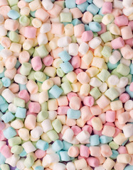 Colorful Candy Background with Small Colored Marshmallows, top view, flat lay