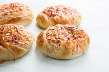  crab cheese bread close up on white background.