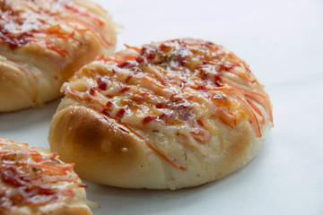  crab cheese bread close up on white background.
